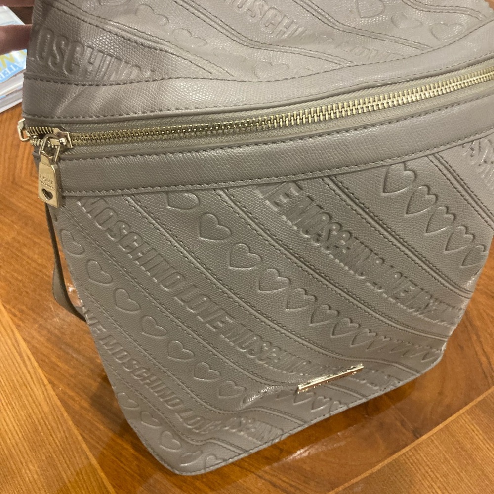 Gray Moschino handbag, backpack style